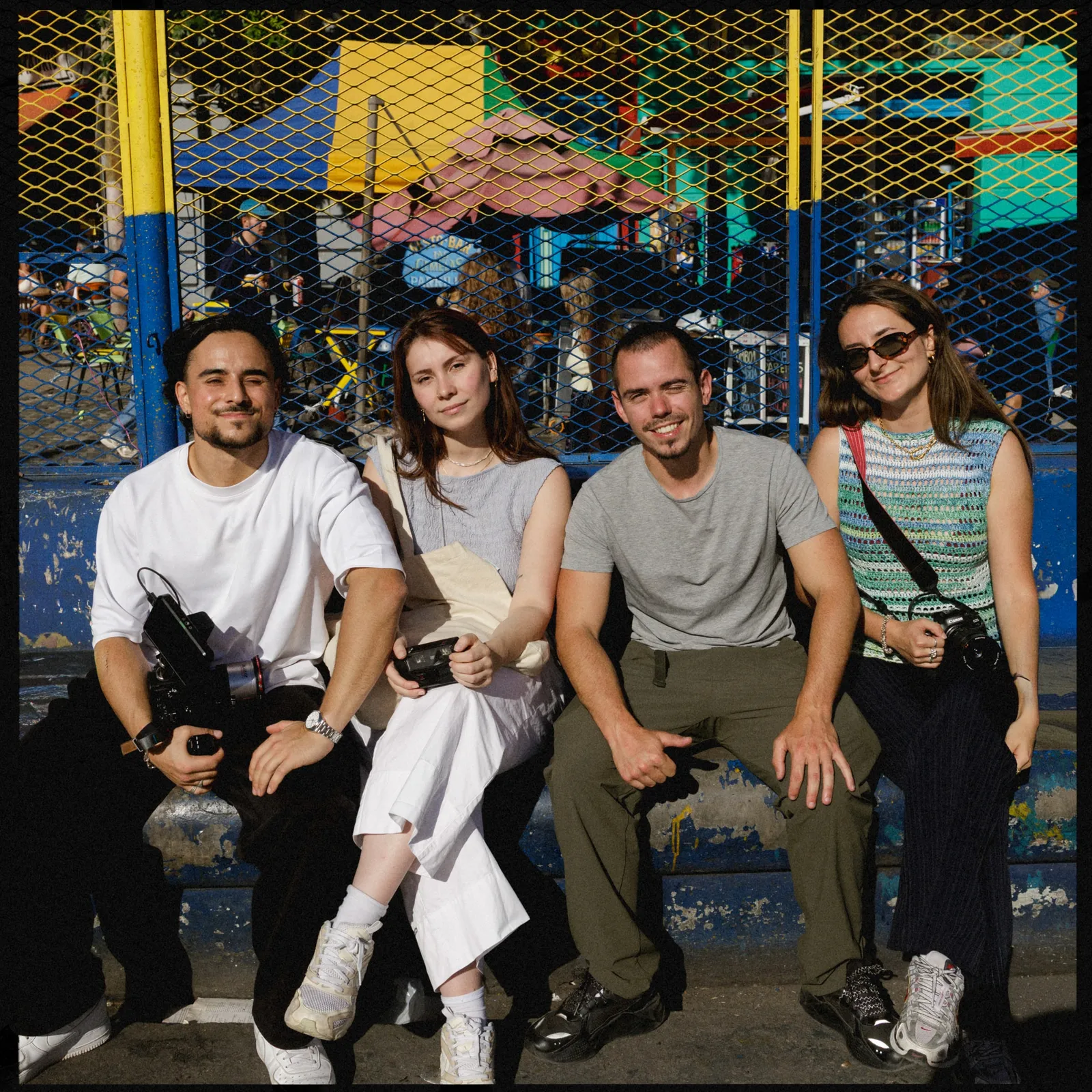 Four crew members on location.